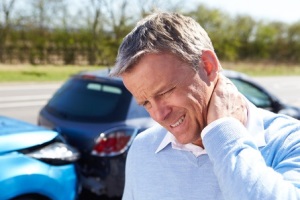 man with neck pain