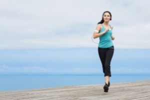 woman jogging on the beach